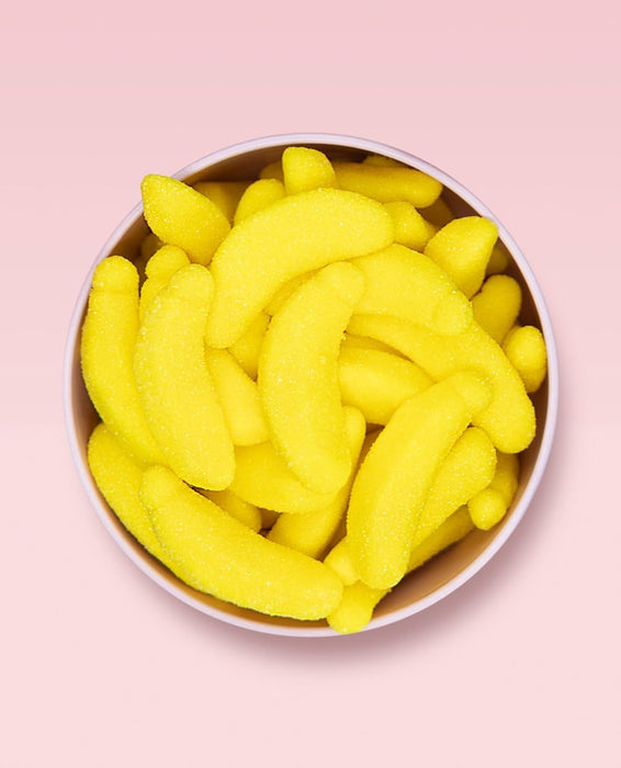 Vidal Golosinas Plátanos de Goma con Azúcar (Bolsa 1kg): Disfruta del auténtico sabor a plátano en este caramelo de goma sin gluten recubierto de azúcar. Vidal - ingredientes