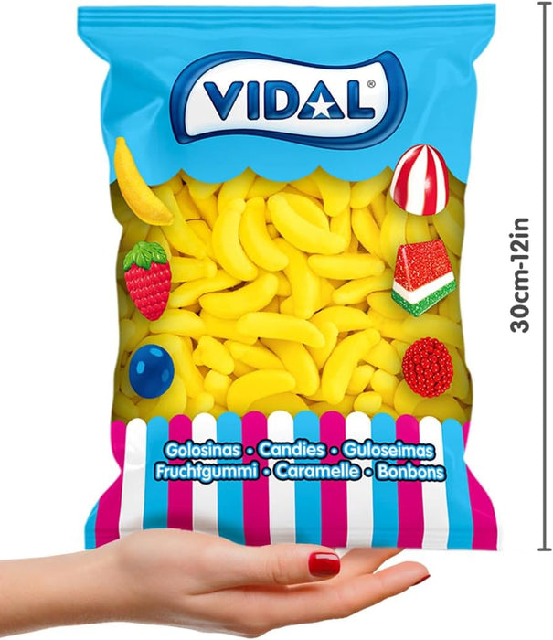 Vidal Golosinas Plátanos de Goma con Azúcar (Bolsa 1kg): Disfruta del auténtico sabor a plátano en este caramelo de goma sin gluten recubierto de azúcar. Vidal - lateral